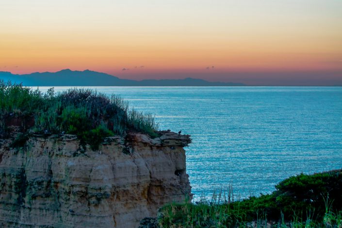 Alba a Sant'Andrea. Costa adriatica del Salento.